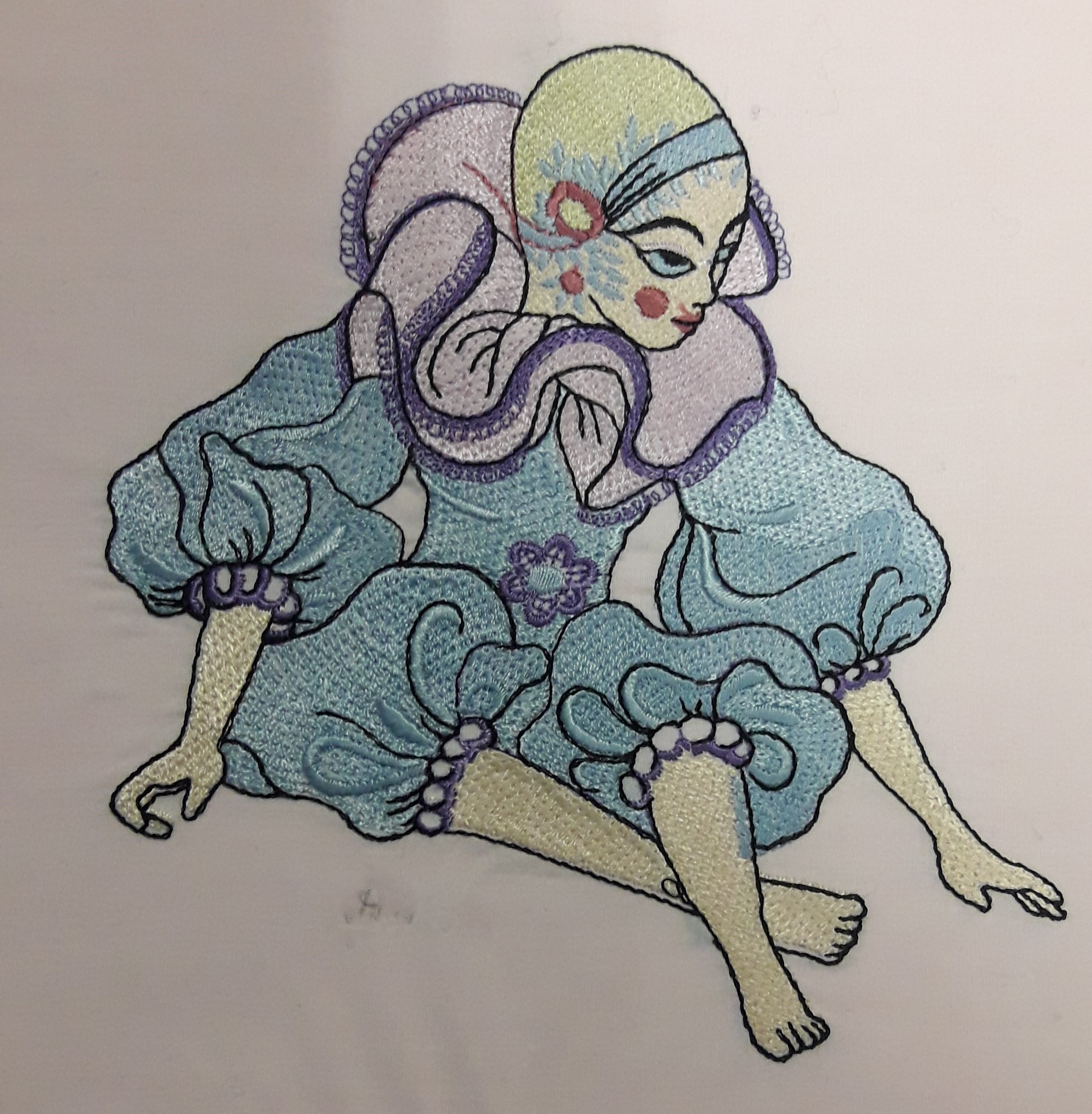 Figura di Pierrot ricamata